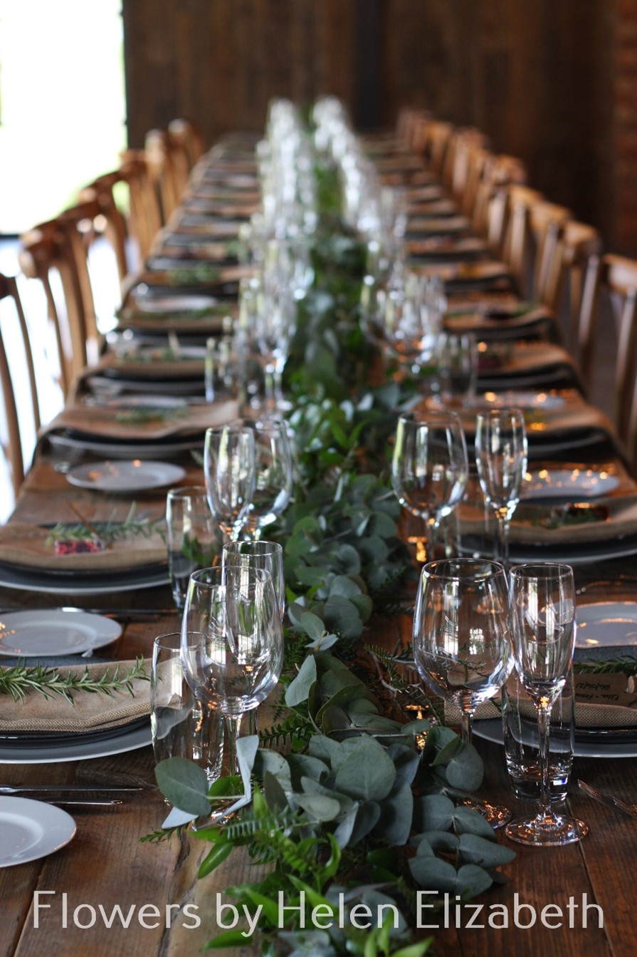 Silchester Farm wedding table decorated with garland
